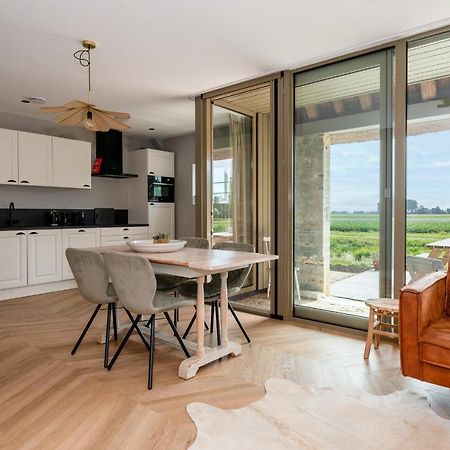 Appartement De Dageraad In Monumentale Boerderij Kimswerd Bagian luar foto